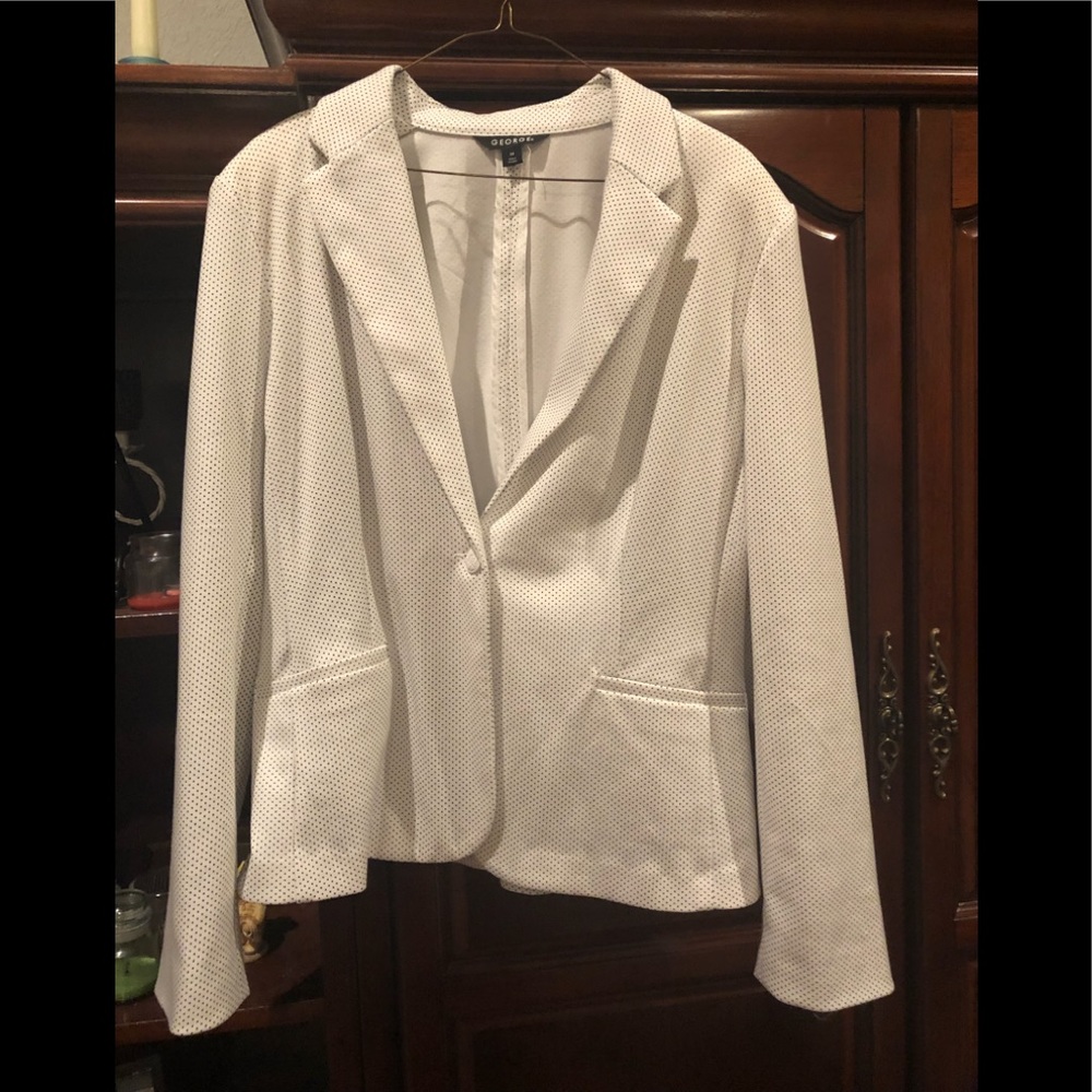 White and black polka dotted suit jacket